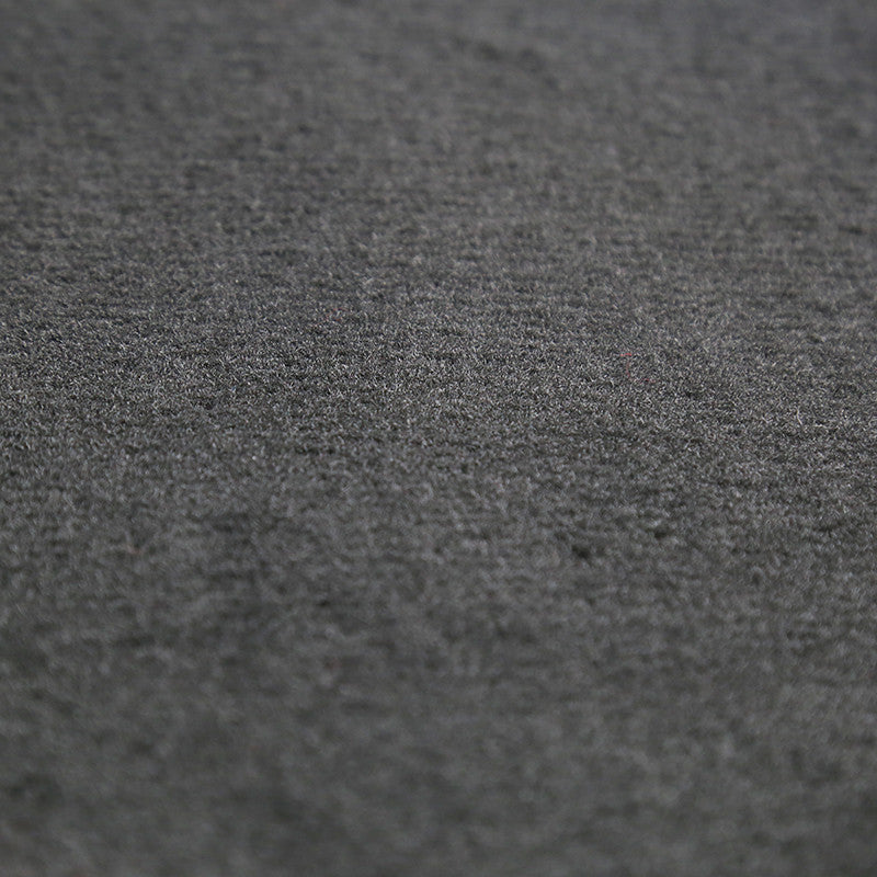Close-up of grey cotton carpet texture showing quality weave