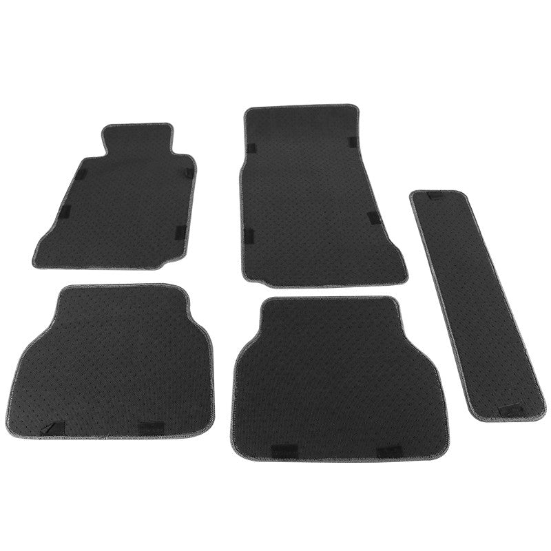 5-piece black carpet floor mat set showing non-slip backing clips - underside view