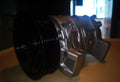 Automotive air conditioning compressor with pulley and mounting brackets