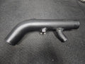 Reverse view of black charge pipe with mounting points