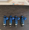 DeatschWerks 850cc Subaru fuel injector with blue body and electrical connector