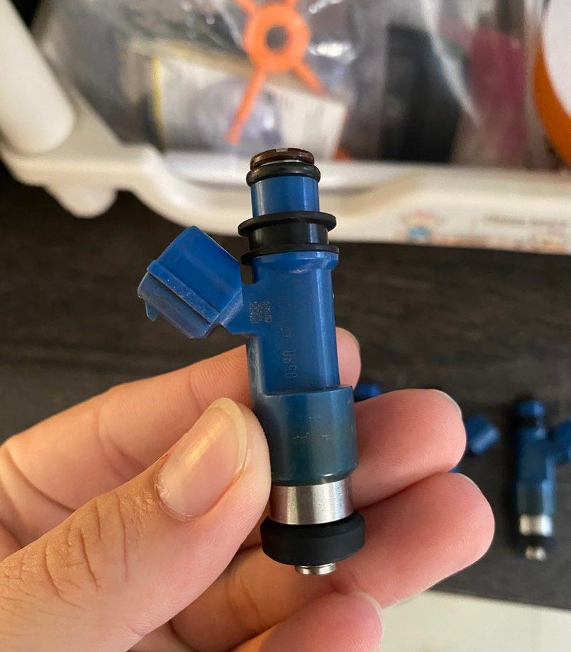 Set of four blue DeatschWerks 850cc Subaru fuel injectors