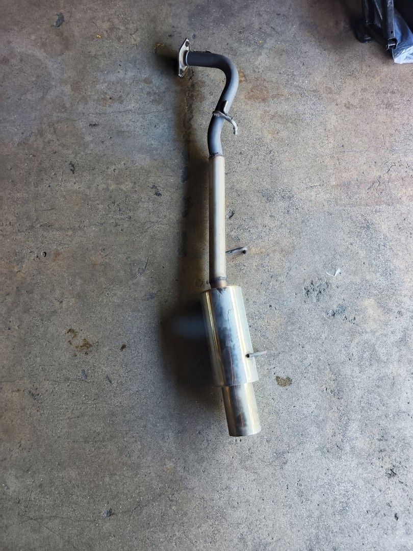 HKS exhaust assembly showing flange, hangers and single outlet