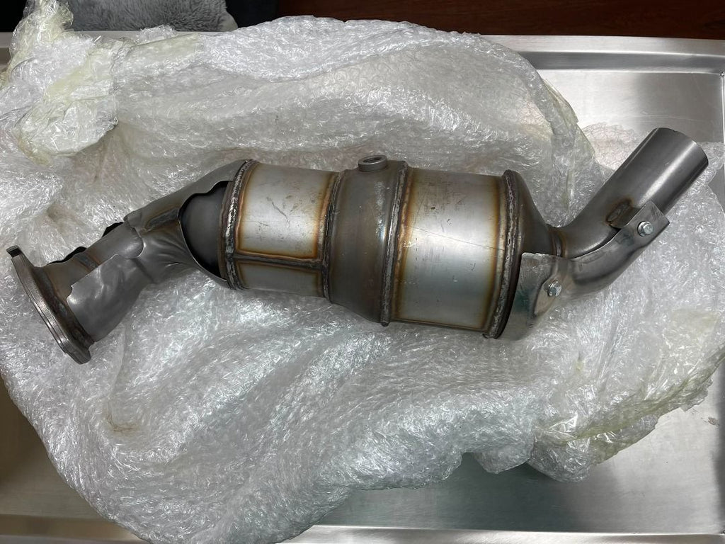Jaguar XE downpipe and catalytic converter full view