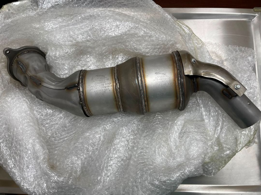 Jaguar XE catalytic converter showing part markings and pipe layout
