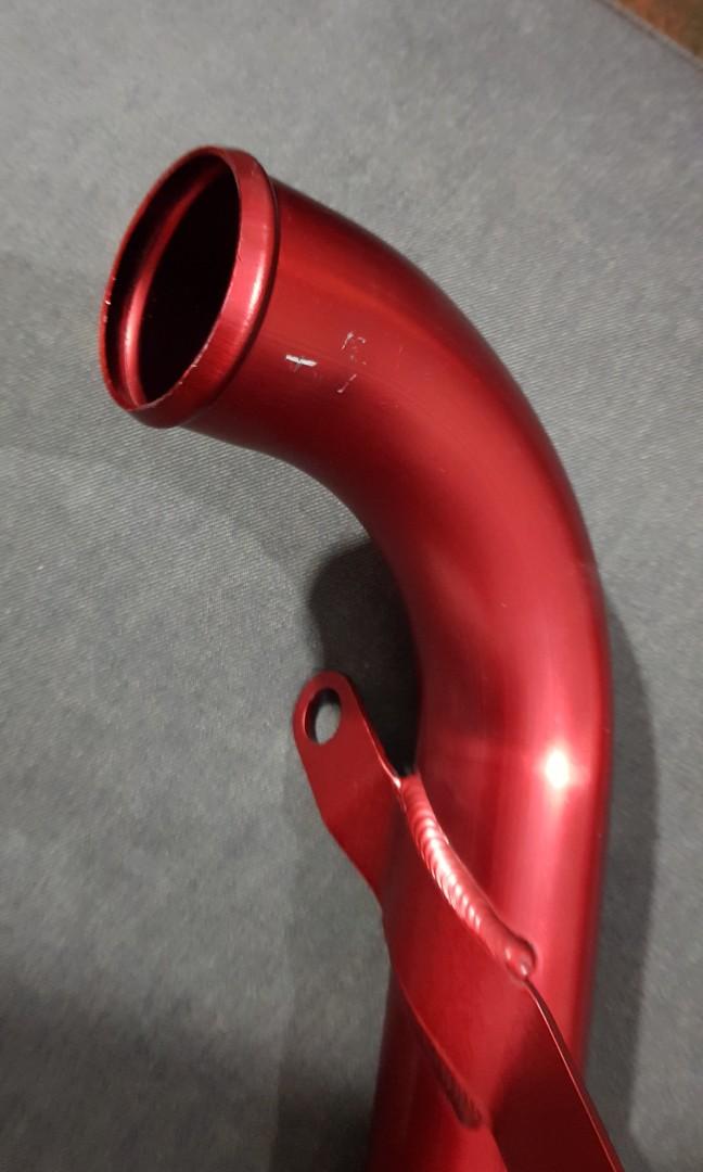 Black hose section and red connection on Mitsubishi Evo X intercooler pipe