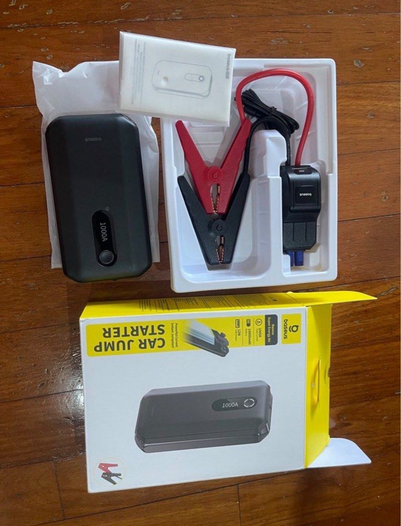 1,000A portable car jump starter with clamp leads and packaging