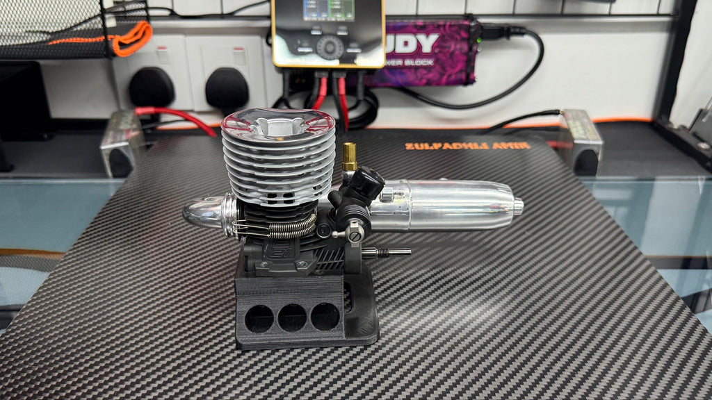 OS B2104 engine side view showing carburettor and exhaust