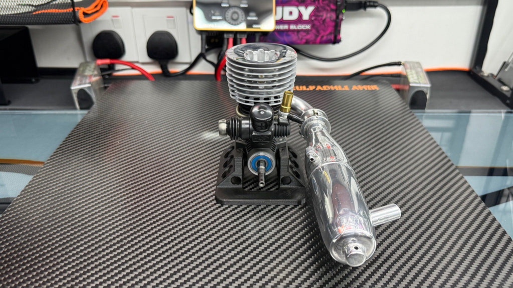 OS B2104 engine rear view with polished muffler